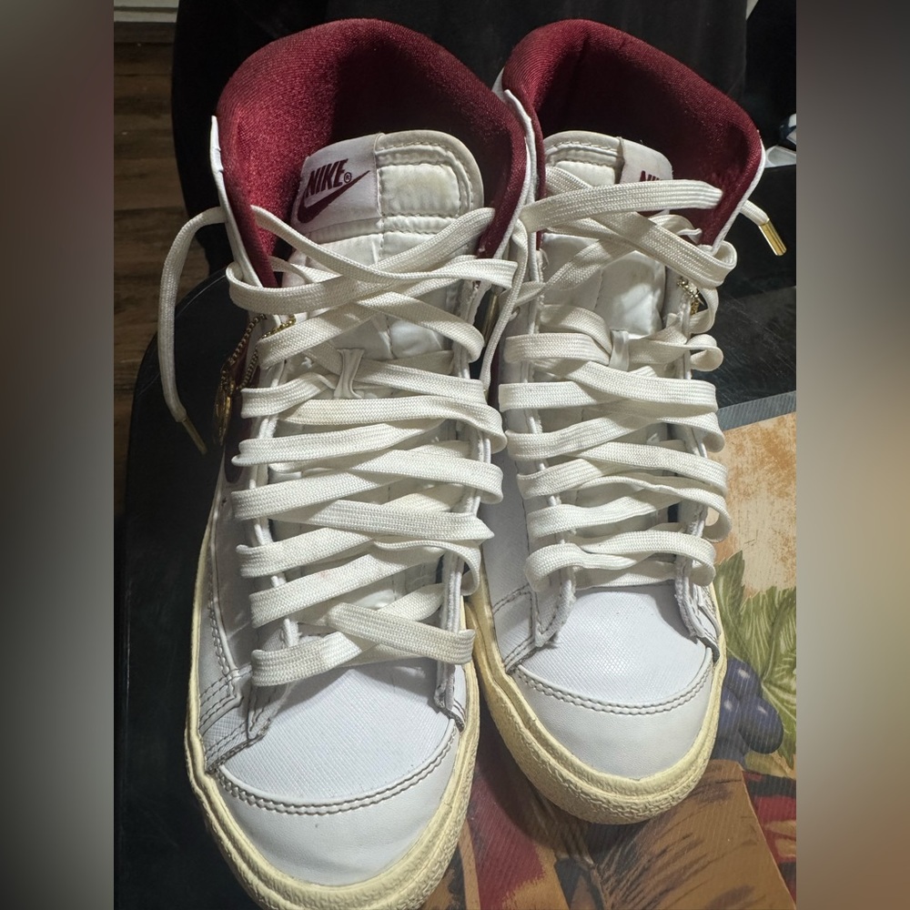 Nike White High-Top Sneakers with Burgundy Interior and Gold Accents